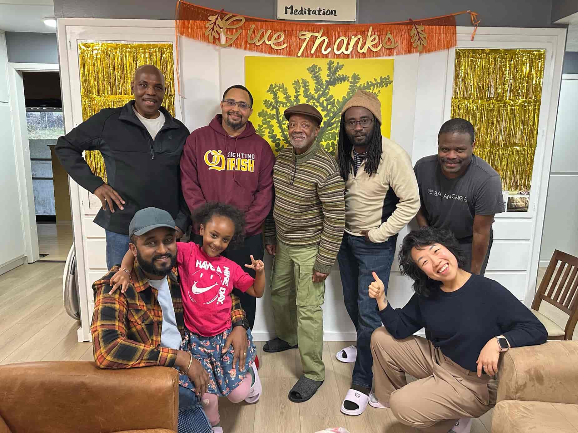 Members and their families at a Give Thanks celebration at the center
