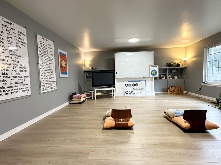 The meditation room at Federal Way Meditation, with floor seats and natural light